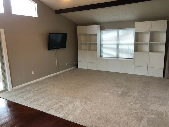 Den with IKEA wall storage - 9633 Chukar Cir