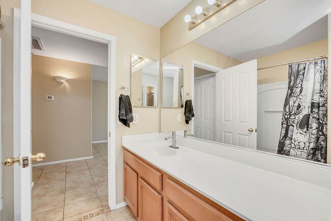 Building Photo - **Stunning 4-Bedroom, 3-Full Bath Home with Double Master Suites and Den