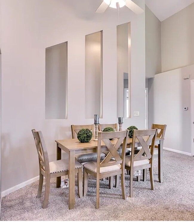 Building Photo - Spacious Corner Townhome with Private Yard...