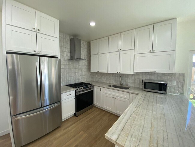 Primary Photo - Newer Build! 4BD/2BA on 63rd