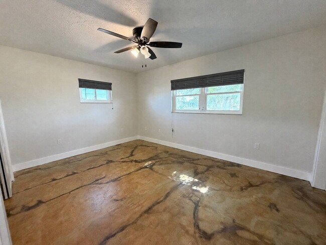 Building Photo - "Waterfront Home with Dock! 3-Bedroom Oasis with 2 Baths and 1,800 Sq Ft of Comfort in Hudson, FL!"