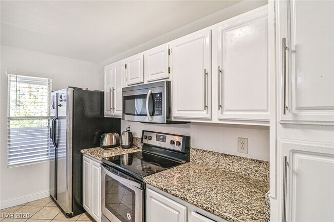 Building Photo - 5055 W Hacienda Ave