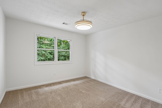 Building Photo - Bright and Gorgeous - Updated 3BR/2BA Townhome!