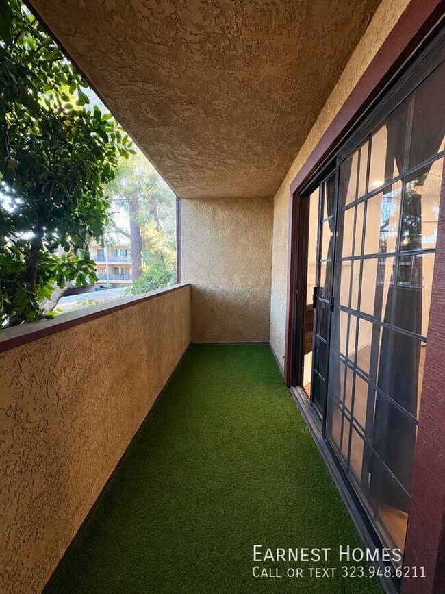 Building Photo - 10220 De Soto Ave