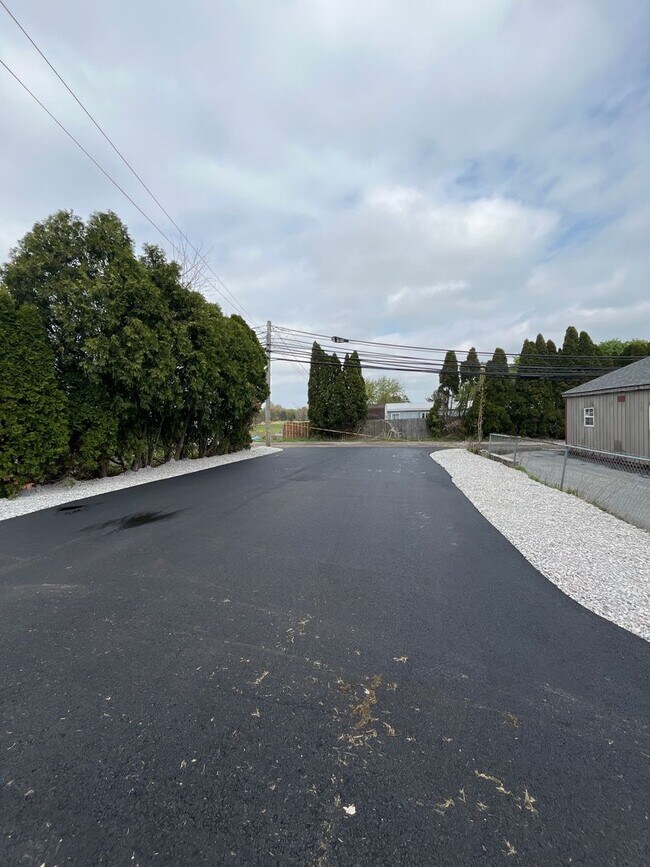 Building Photo - A real stunner! The full renovation is the first thing you'll notice..