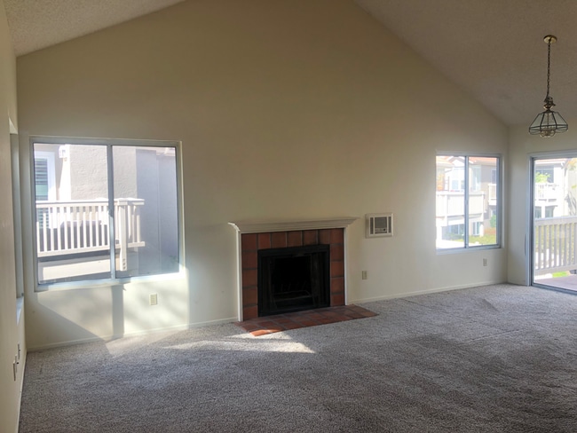 living room before update - 930 Via Mil Cumbres