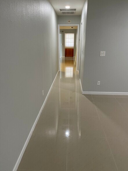 Living room and hallway - 3633 Country Club Blvd