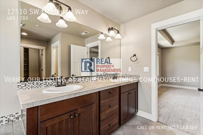 Building Photo - 12510 SW Moorhen Way