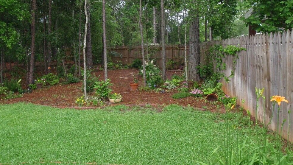 park-like backyard - 409 Redbud Cir