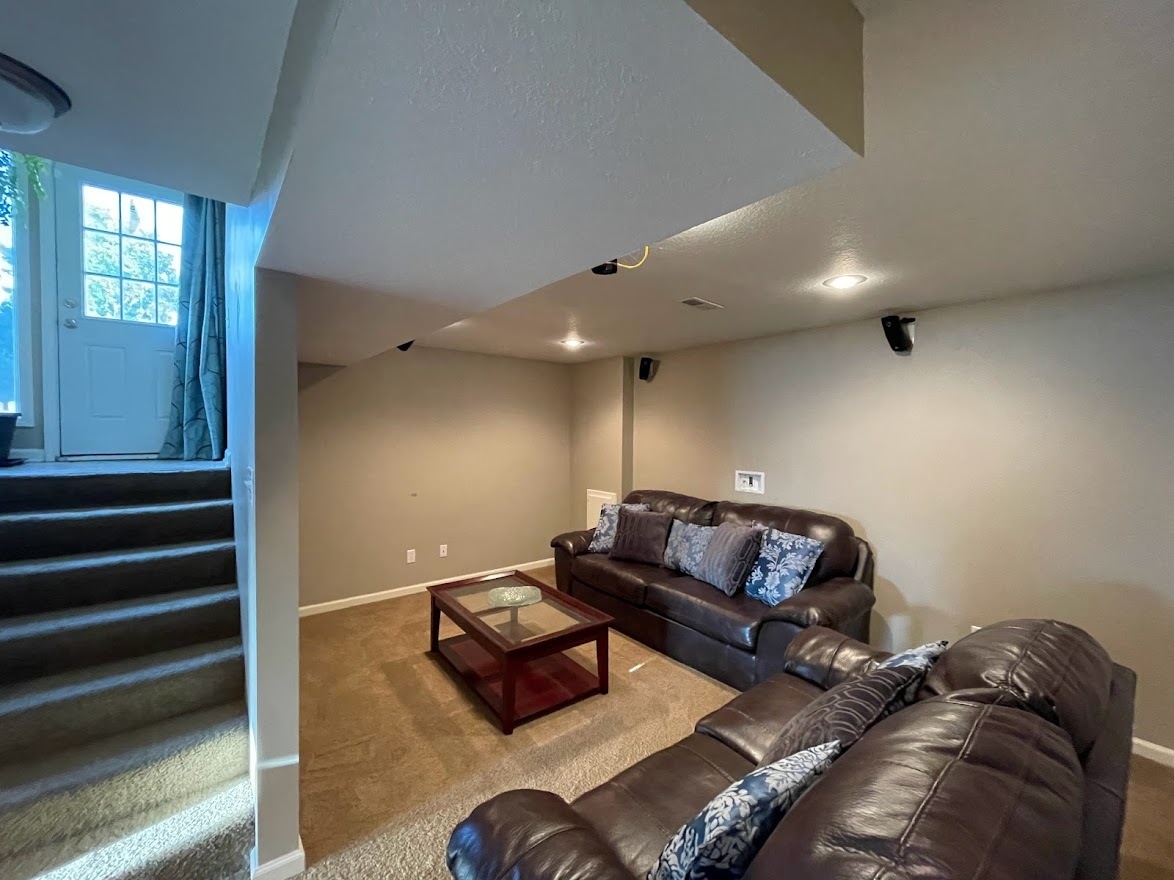 Basement Media Area looking out to Side Exterior Entry - 13846 W 154th Ter
