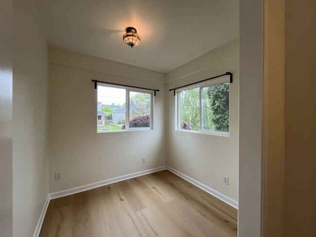 Building Photo - Character-Filled Concordia Home with Flexible Living Spaces & Gas Fireplace