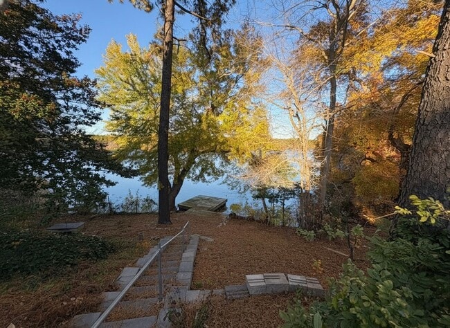 Building Photo - Lakefront 3-Bedroom Home with Dock & Stunn...