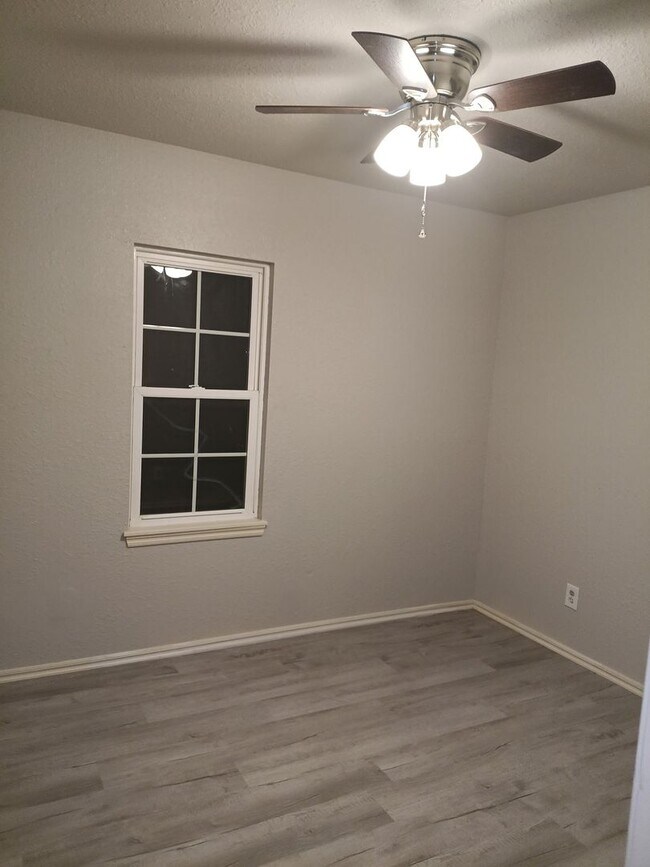 Building Photo - Two bedroom home with over half of acre  o...