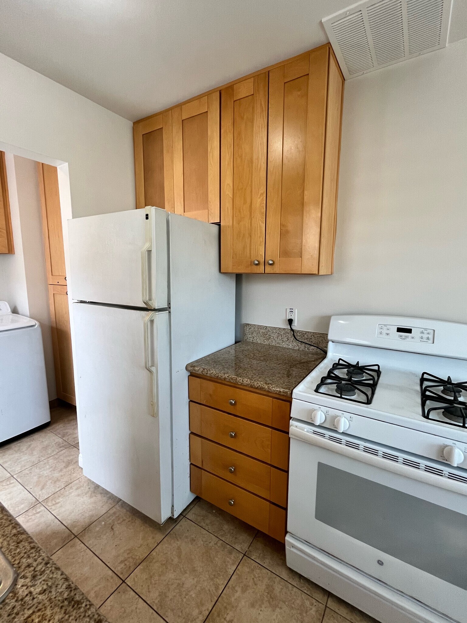 one side of kitchen - 1105 Grand Ave