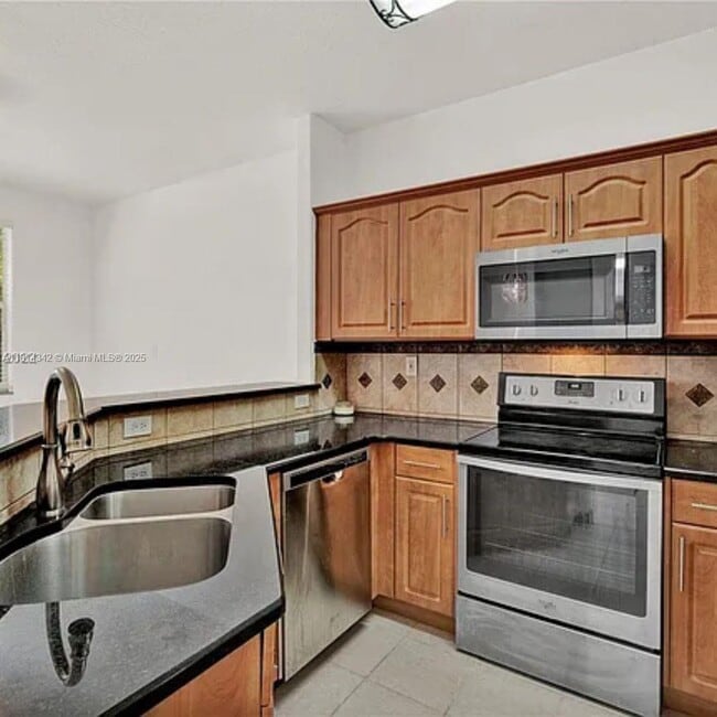 Building Photo - 10902 NW 79th St