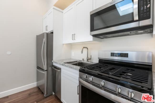 Building Photo - 7851 Airlane Ave