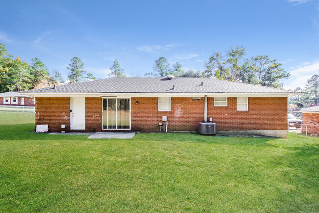 Building Photo - Classic Brick Home with Large Backyard