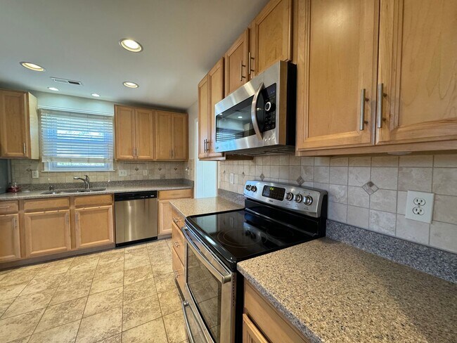 Building Photo - Welcome to this charming bungalow-style home!