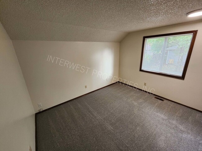 Building Photo - 3 Bd that Features Master on the Main with Fenced Yard, 2 Car Garage, & W/D Hookups