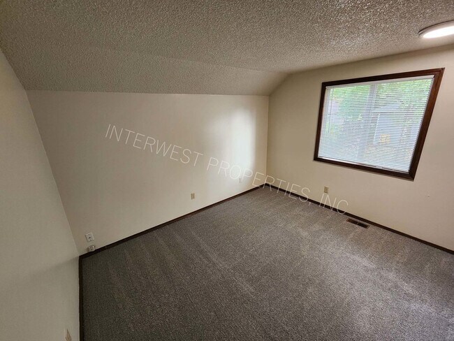 Building Photo - 3 Bd that Features Master on the Main with Fenced Yard, Fireplace, 2 Car Garage, & W/D Hookups