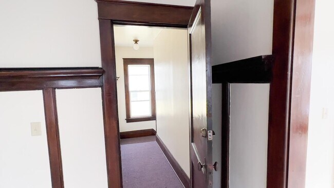 Door off of dining room to front door entrance - 1559 S 75th St
