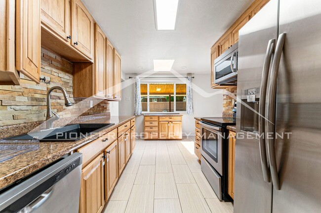 Building Photo - Spacious Home with Fenced Yard and Central AC