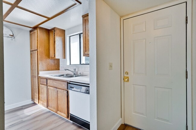 Building Photo - New Vinyl Plank Flooring, Fresh Interior Paint, 1 Car Garage + 1 Assigned Outdoor Parking Space -...