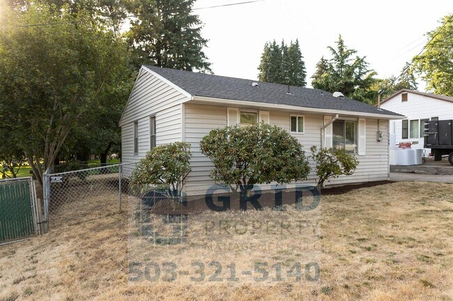 Building Photo - Charming 2BR House with Garage & Private Patio in Vancouver!