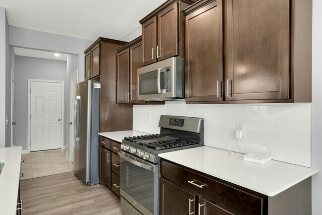 Building Photo - 6447 Inspire Cir S