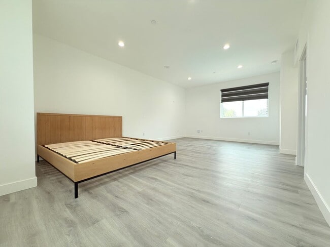 Building Photo - Chic Modern Living in Panorama City – 4 Be...