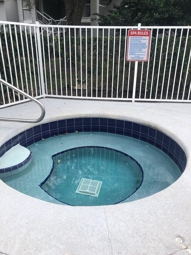 Building Photo - WATER VIEW! 2X2- Spacious 3rd floor condo with tranquil water views from balcony!! Gated Regency ...