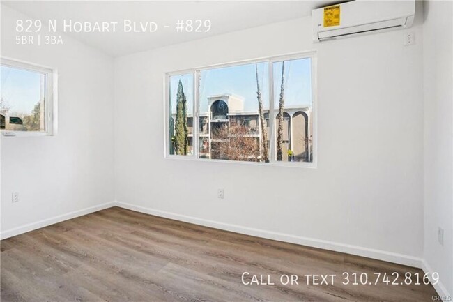 Building Photo - Luxe Living at 825 N. Hobart Blvd. – Where...