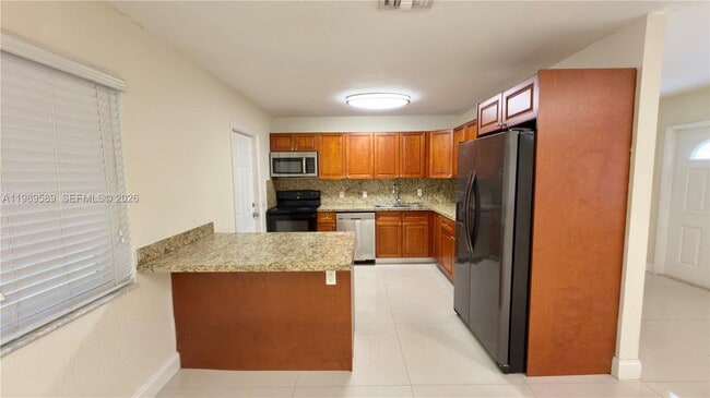 Building Photo - 1125 NW 16th Ct