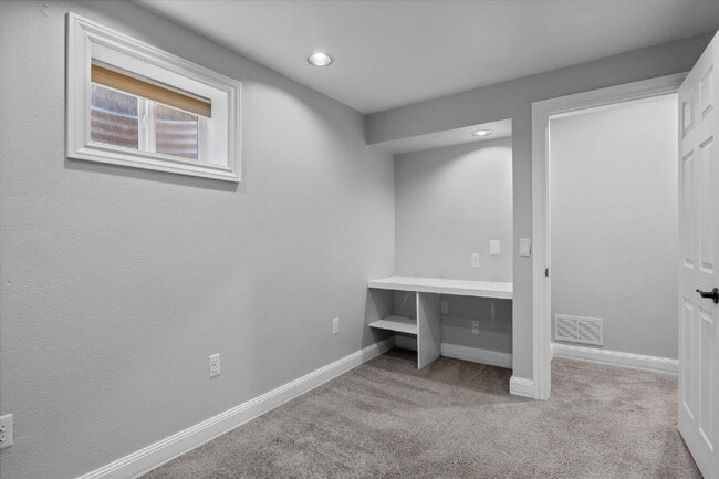 Building Photo - Beautiful 4 Bedroom Home with Backyard The...