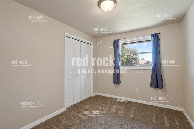 Building Photo - 2211 E 49th Ave