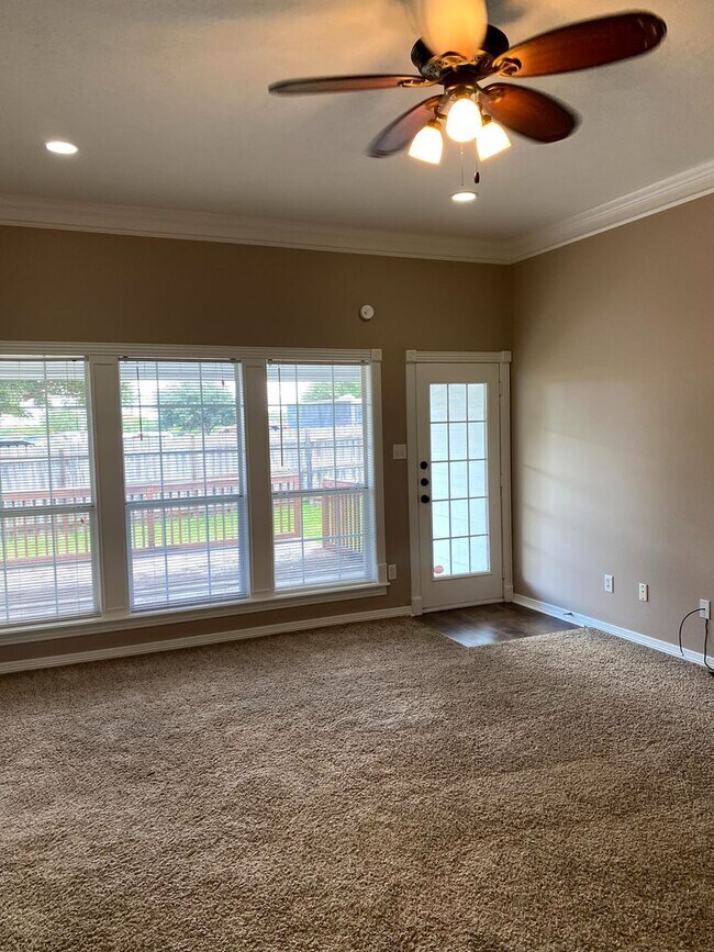 Building Photo - FABULOUS THREE BEDROOM HOME WITH LARGE DECK, FIREPLACE AND FLEX ROOM