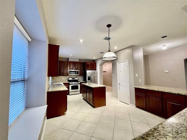 Building Photo - 5527 Custard Apple Trail