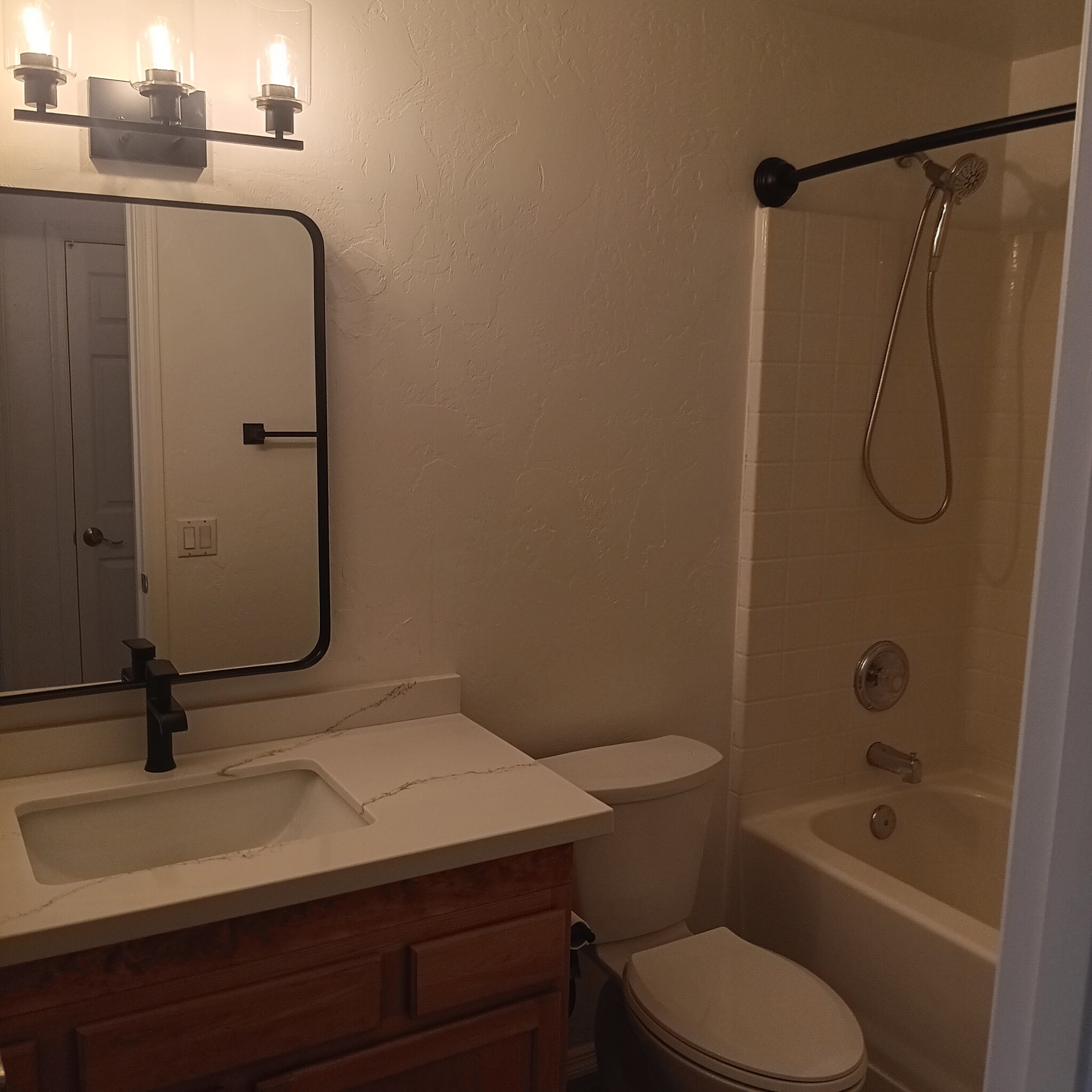 Remodeled second bathroom with linen shelves - 2411 E Stone Stable Dr