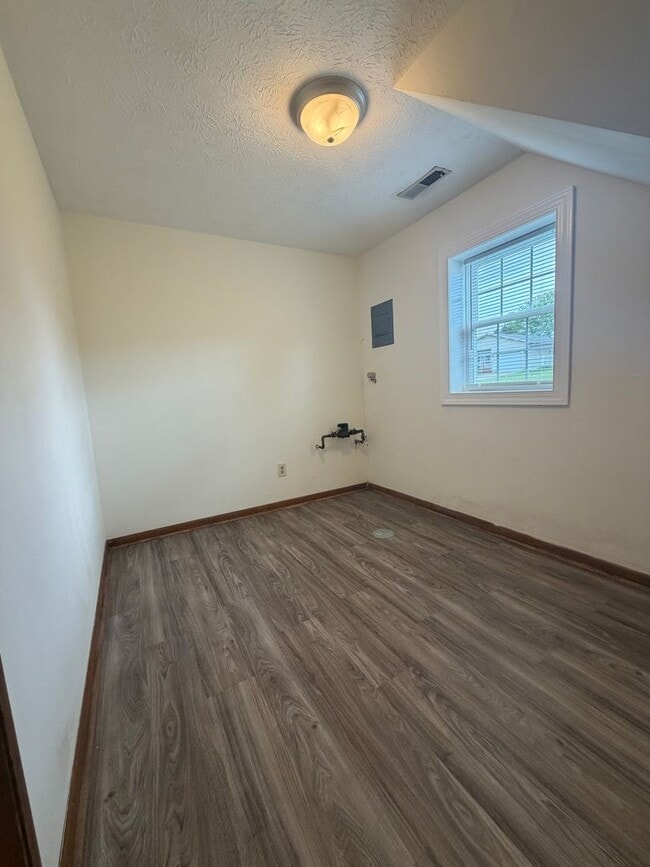 Building Photo - One Bedroom Duplex