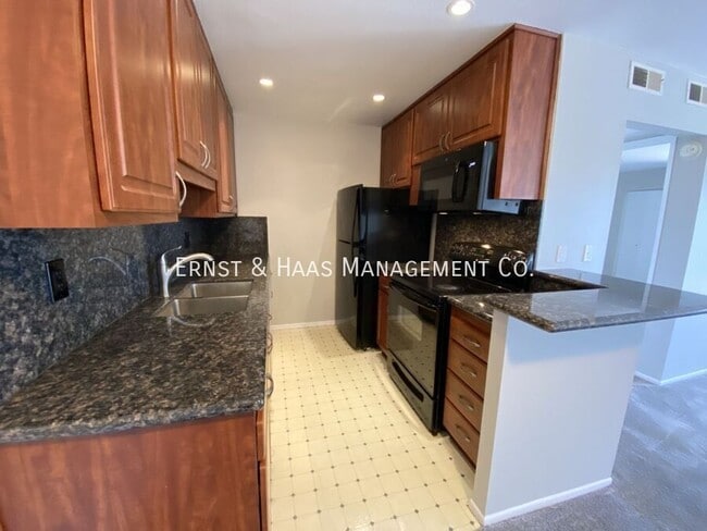 Building Photo - 576 N Bellflower Blvd
