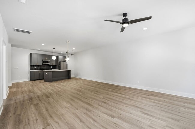 Building Photo - Bright, Open & Exceptionally Large—Your Ideal 2-Story Townhome