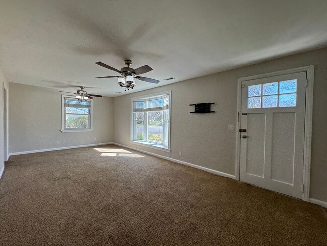 Building Photo - Welcome to this charming bungalow-style home!