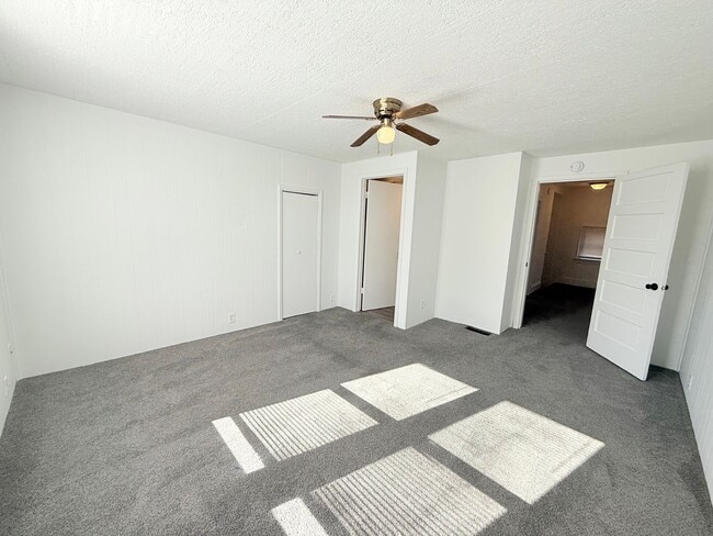 Building Photo - Spacious 4-Bedroom Home with Fenced Backyard