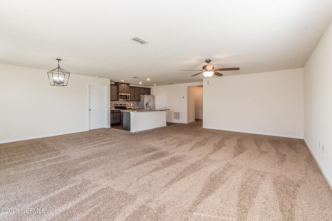 Building Photo - 15697 Saddled Charger Dr