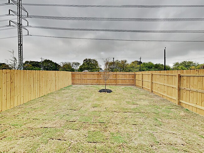 Spacious Backyard with a private fence! - 6265 Eddie Way
