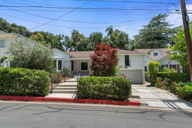 Building Photo - This beautifully updated 4-Bed, 2-Bath Hom...