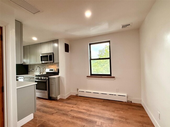 Building Photo - 60-66-66 75th St