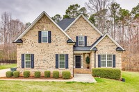 Building Photo - Stunning 4 bedroom, 3 bath custom home in ...