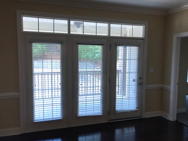 Living room looking out into private back deck - 1931 Dante Ln