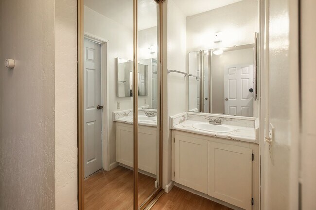 Building Photo - Peaceful Forest-View Condo with Fireplace & Private Balcony in Golden Oaks